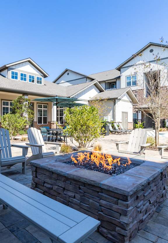gather around the fire pit on the spacious patio