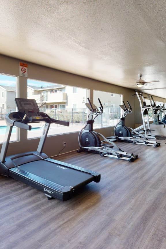 the gym at the view at cortland apartments at Aspire High Desert Apartments, 92392
