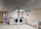 Thumbnail 9 of 34 - Laundry facility area for residents at Woodlee Terrace Apartments, Virginia