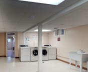 Thumbnail 9 of 34 - Laundry facility area for residents at Woodlee Terrace Apartments, Virginia