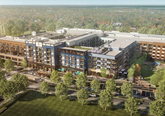 a rendering of a large brick building with a red sign that says rockwell automation