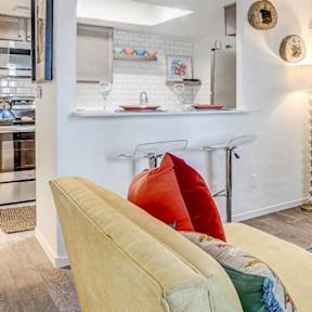 Living Room With Kitchen View at The 95 Apartments, Las Vegas, Nevada
