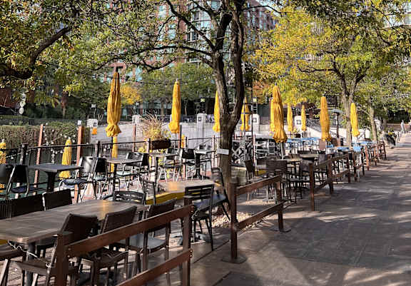 A large stadium with a Ferris wheel in the background.