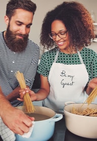 Dominium_Village Meadows Apartments_Couple Cooking Lifestyle Image