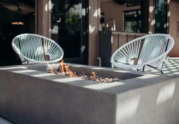 Outdoor courtyard firepit and seating area