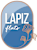 A logo with the text "Lapiz flats" and a graphic of a flower.