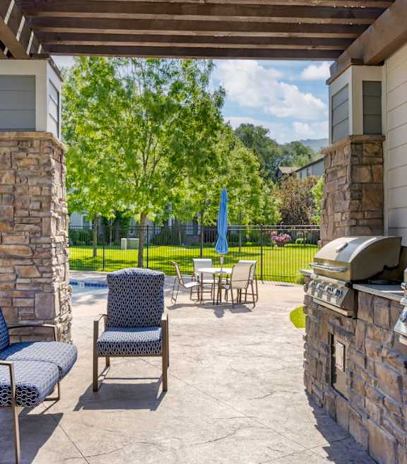 Outdoor Patio and BBQ at Falls at Riverwoods Logan, UT