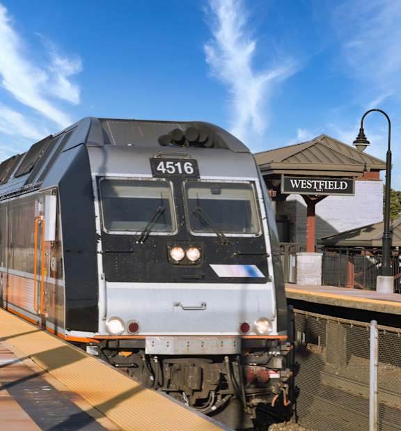 A train with the number 4516 on it is at the Westfield station.