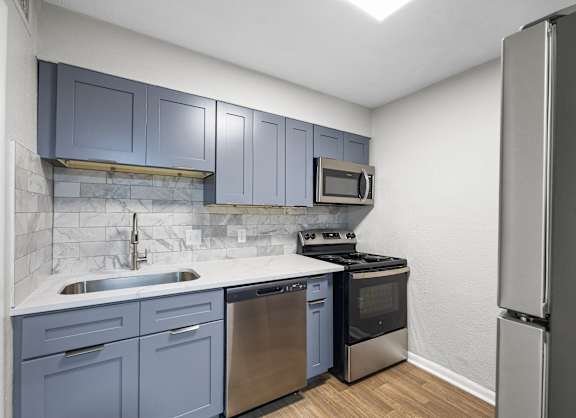 Renovated kitchen with stainless steel appliances