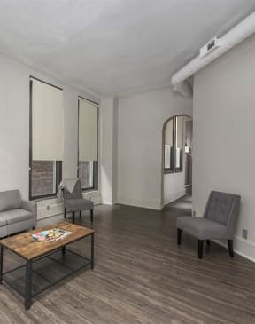 a living room with a couch and a coffee table at East 4th Street, Cleveland, Ohio