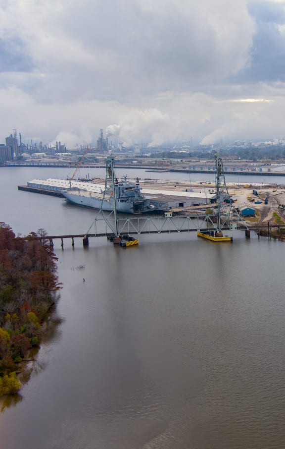 an aerial view of a city with tall buildings and a river