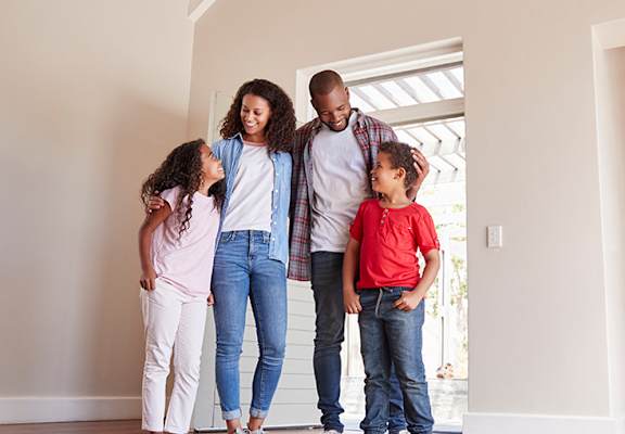 Happy family in new apartment
