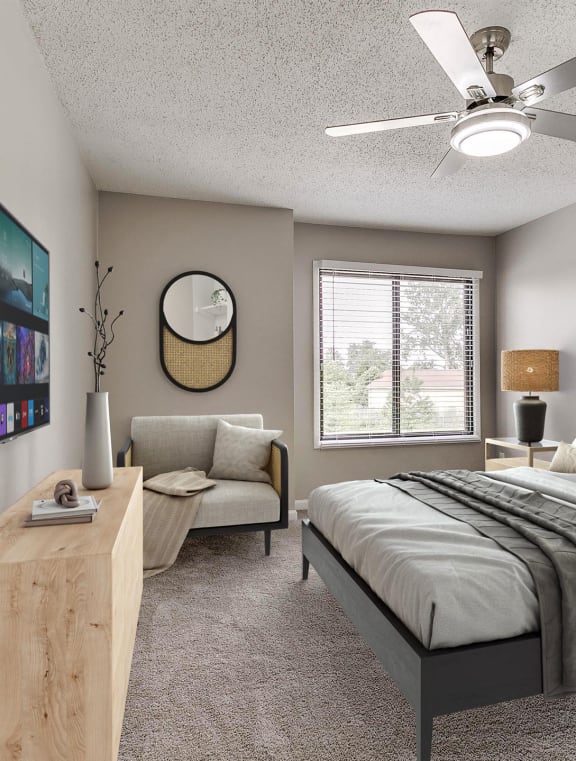 a bedroom with a large bed and a large clock on the wall