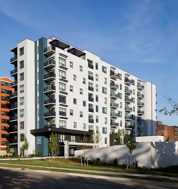 a rendering of a building with people walking in front of itat 101  at 101 Base Line Road West, London