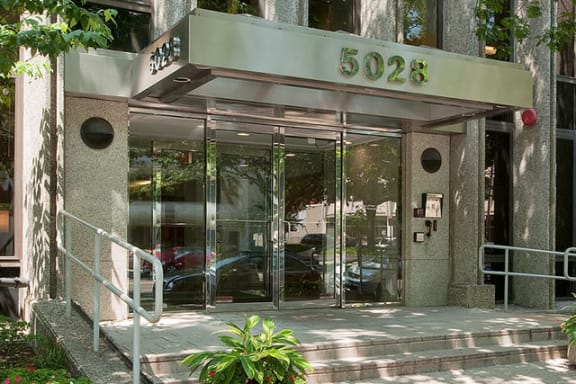 a building with a large glass door and a sign that says 522