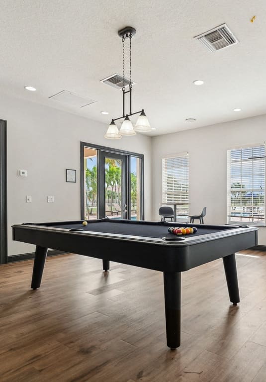 the preserve at ballantyne commons spacious game room with pool table