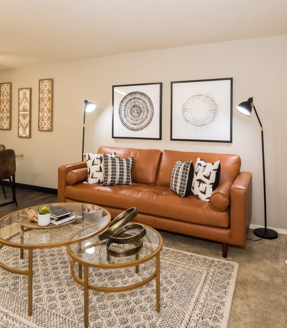 St. Mary's Woods model apartment living room with couch and coffee table at St. Mary's Woods Apartments, Beaverton, 97078