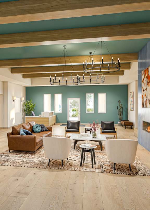 Spacious resident lounge with wood beam ceiling at Vivir at Ballpark Village Apartments, Goodyear, AZ