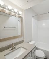 Model Unit Bedroom at Woodlands of Plano Apartments in Plano, TX