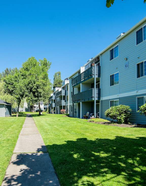 Hunt Club Apartments building exterior and walking path