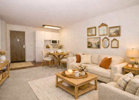 Room with dining area and gallery wall at Hilltop Commons Senior Living Apartments, Grass Valley, CA 95945
