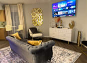 Thumbnail 1 of 17 - Renovated apartment living room with vinyl plank flooring at The Haven at Craigshire