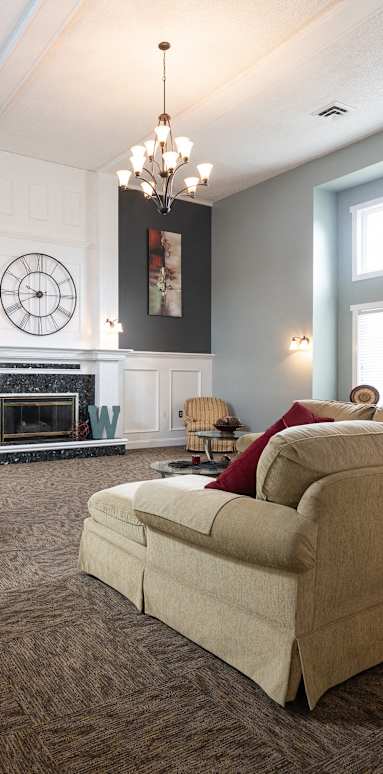 Cozy Wilshire Apartments clubhouse with inviting furniture and a bright, open space for community gatherings.