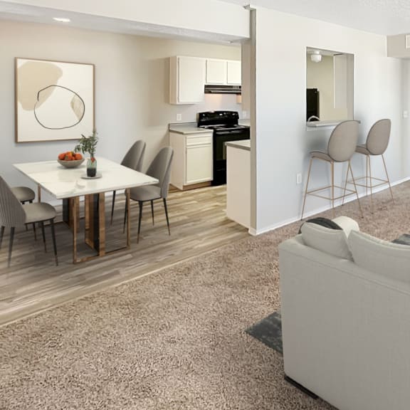 a living room and dining room with a couch and a table