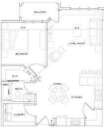 A floor plan of an apartment with a living room, bedroom, kitchen, dining area, and laundry room.