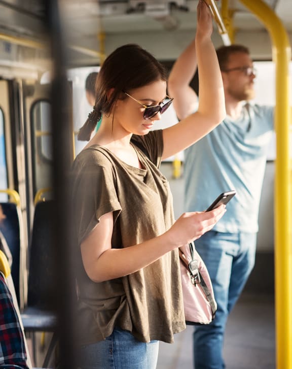 people on a bus using their cell phones at Shenandoah Properties in Lafayette, IN 47905