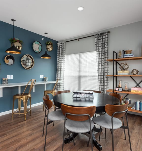 a living room with a couch and a round coffee table