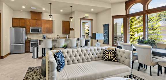 a living room with a couch and a table