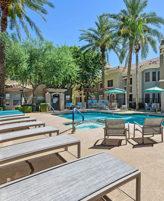 our apartments have a resort style pool with lounge chairs