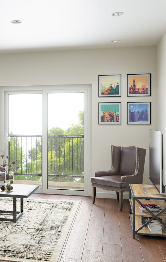 a living room with a couch and chairs and a sliding glass door