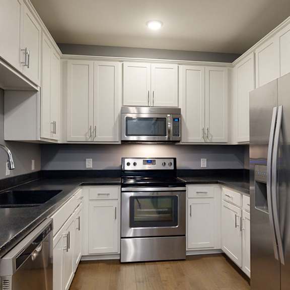 kitchen with white cabinets and stainless steel appliances