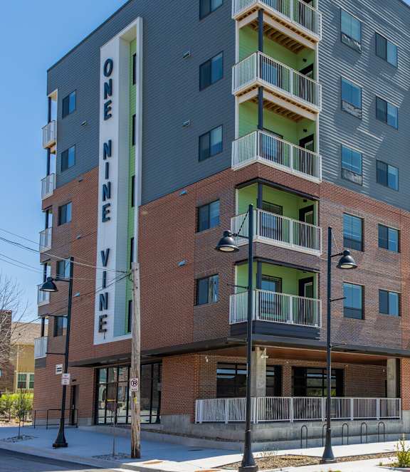 A modern apartment building with the name "ONE VIEW" on the side.