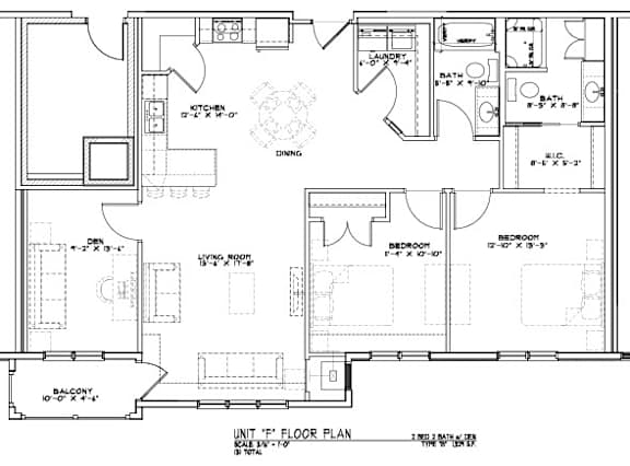 Floor Plan  A floor plan of a house with a kitchen, living room, and bathrooms.