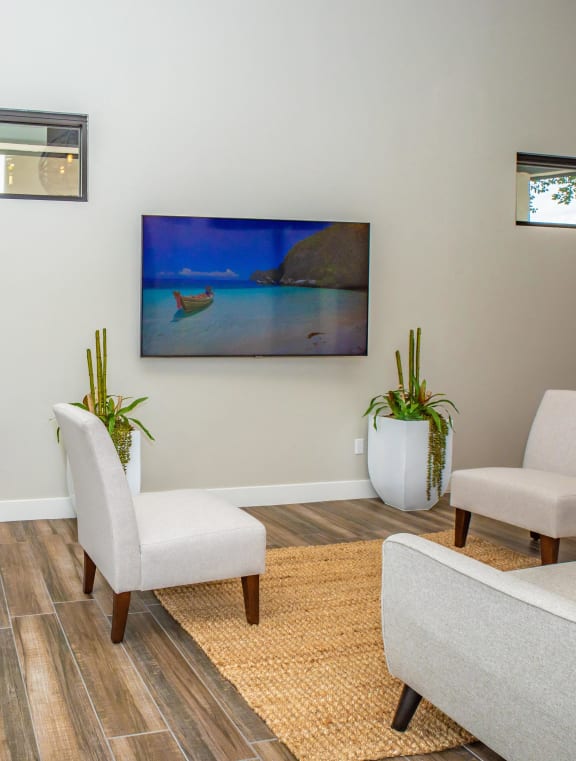 a large living room with a kitchen and a dining room