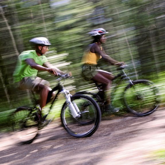 people riding bikes through forest at Kirkwood Meadows, Idaho, 83201