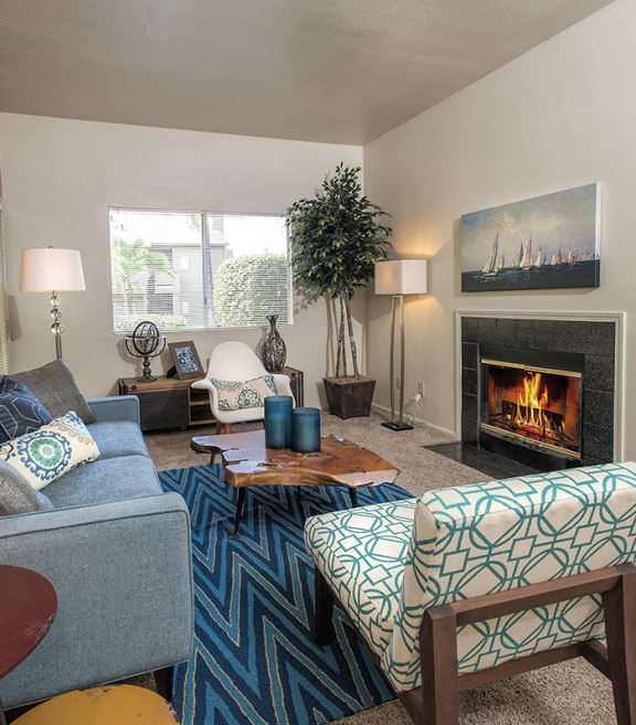 Autumn Oaks apartments model apartment living room and fireplace at Autumn Oaks Apartments, California, 95678