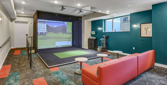 a game room with a ping pong table and a large window