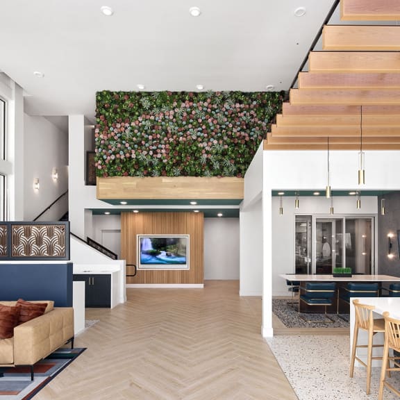 a living green wall in the middle of a living room