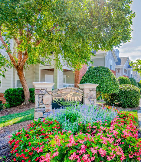 A street view of a residential area with a sign that reads "SOUTHERN".