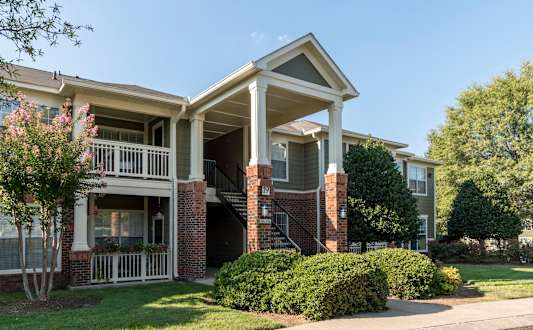Living room area with view and couch at Wyndchase Aspen Grove Apartments, Franklin, TN, 37067