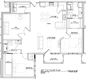 A floor plan of a house with a kitchen, living room, and two bedrooms.