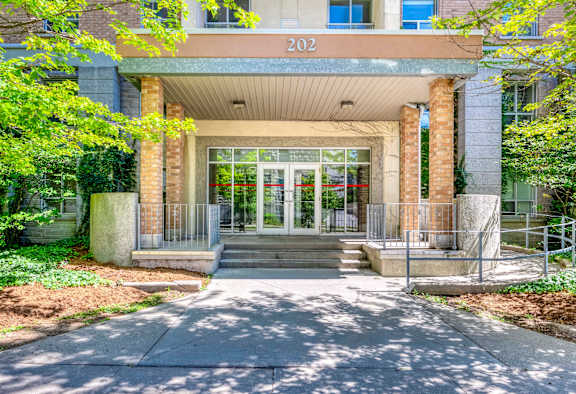 The front of a building with the number 202 on it.