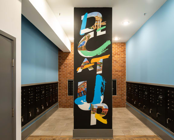 a painting on a wall in a room filled with wine bottles