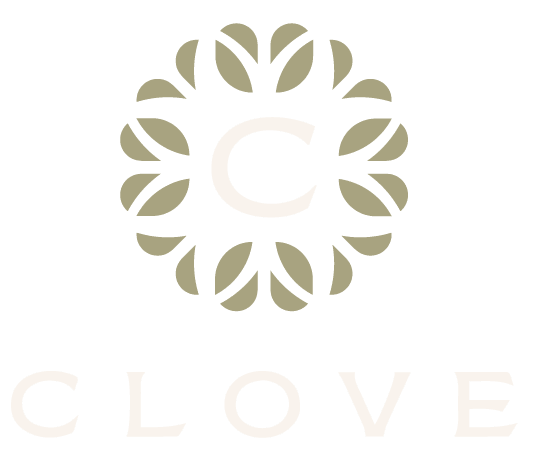 a logo for clove luxury living
