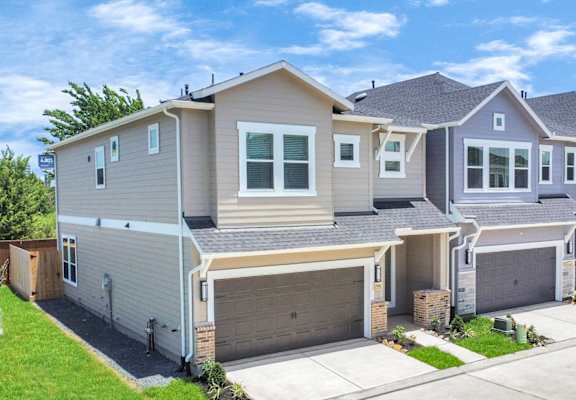 a house with two garage doors