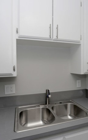 Sink With Faucet at The Marq Apartments LLC, Los Angeles, California